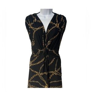 Cache stylish and sexy black and gold mini dress